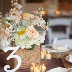 Place Setting With Floral Centerpiece at Wedding